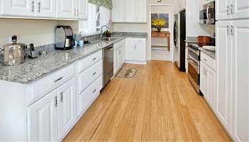 Bamboo tiles give a vibrant look to the kitchen Bamboo tiles give a vibrant look to the kitchen